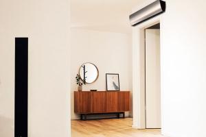 Тепловая завеса на входную дверь: особенности конструкции и эксплуатации